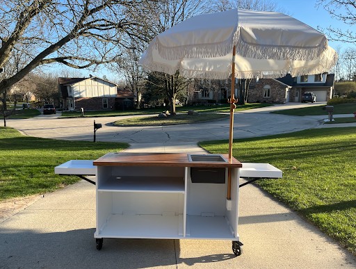 Open back of the shiplap coffee cart: wood top with a drop-in well, fold-out side trays and open storage