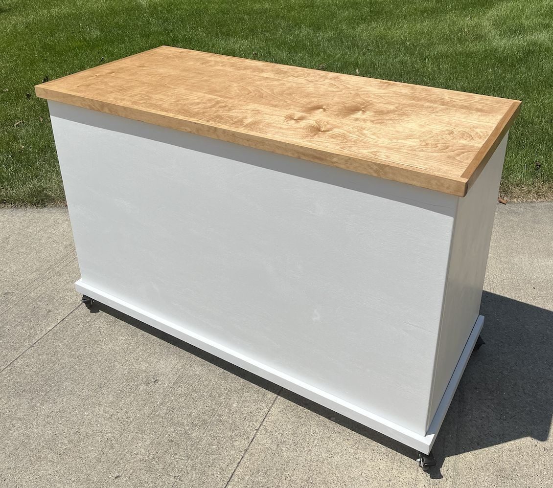 White cart with a solid surface top