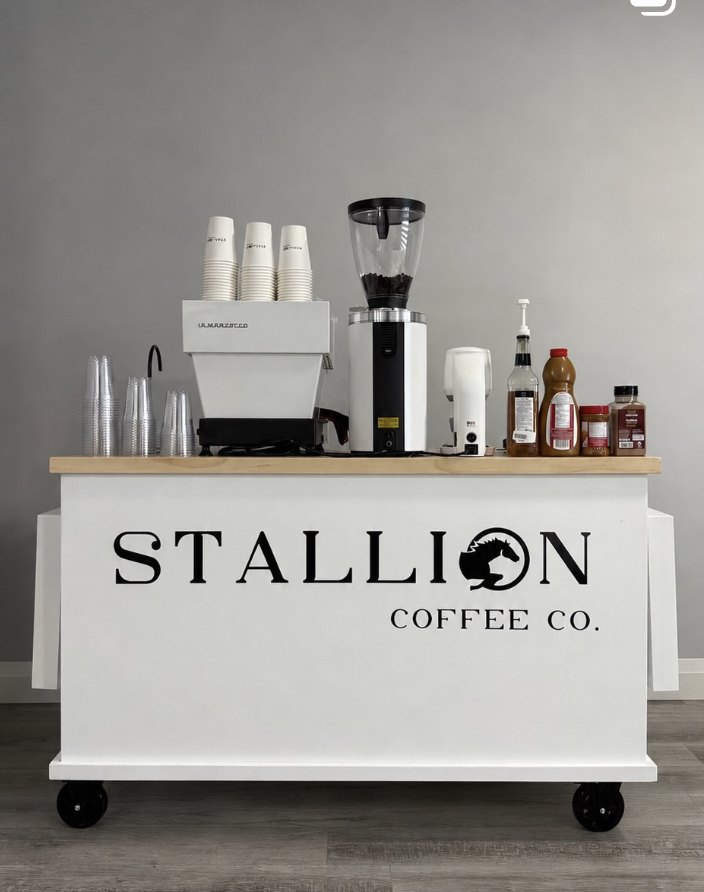 Stallion Coffee Co. cart: a white signature wood-top coffee cart styled with an espresso machine, grinder and cups