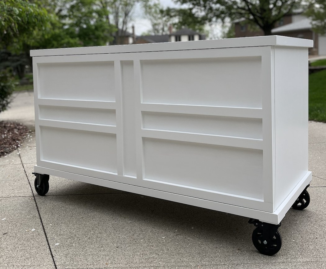 White cart with a freehand raised-trim panel front and a white top